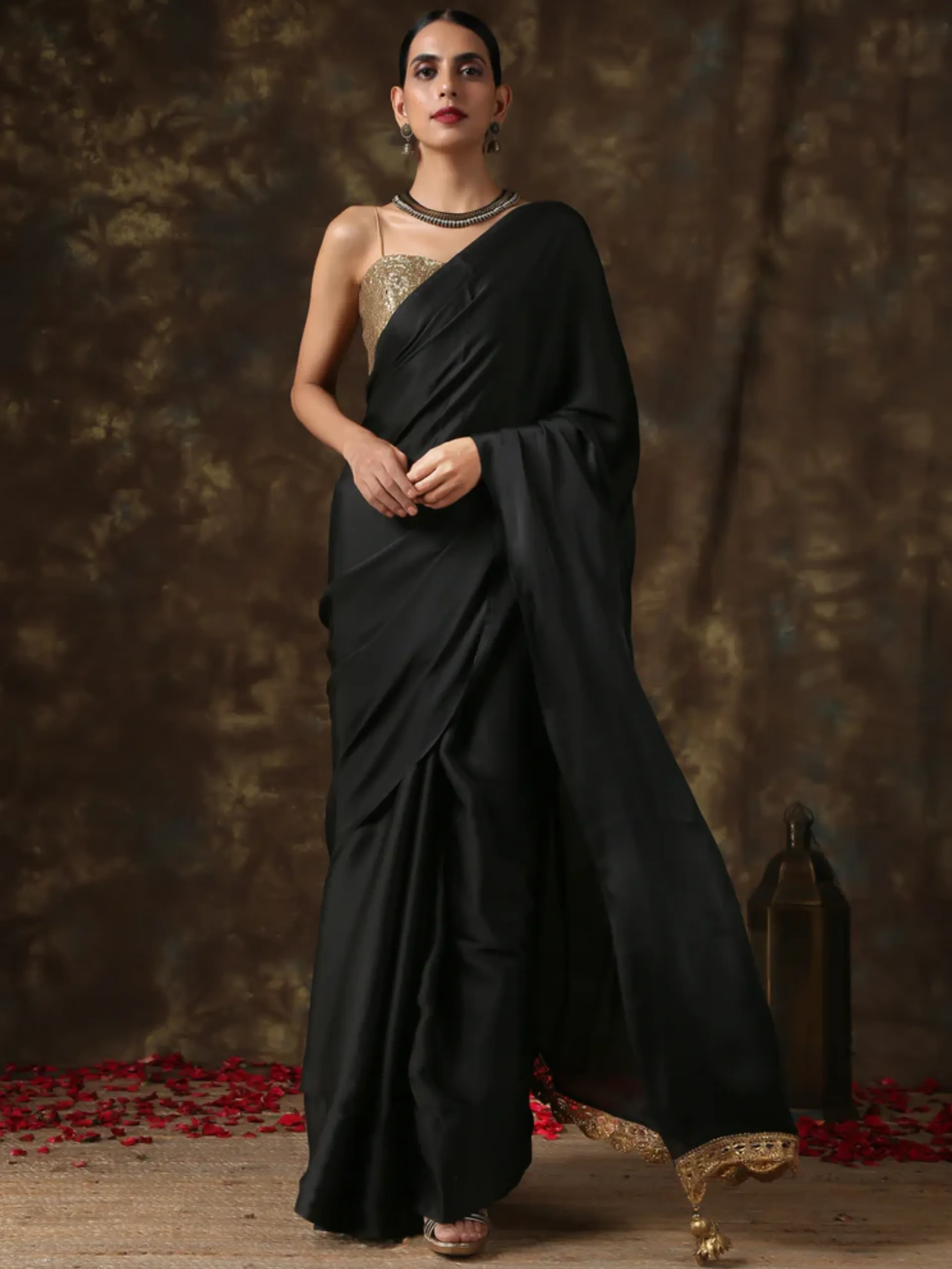 Luxurious Black Satin Saree with Dull Gold Lace and Pendants